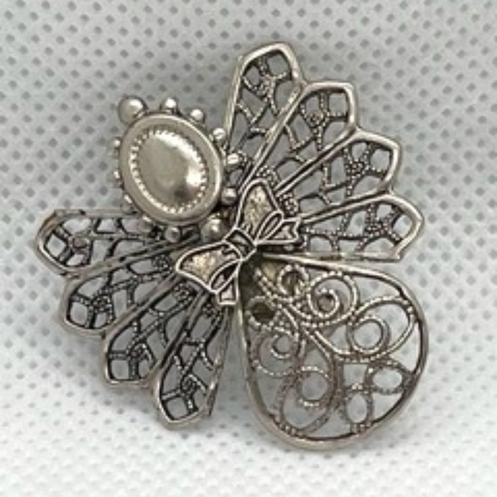Vintage silver filigree angel brooch
